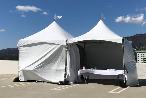 white tents for drive thru covid testing